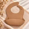 BABERO SILICONA LISO BEIGE
